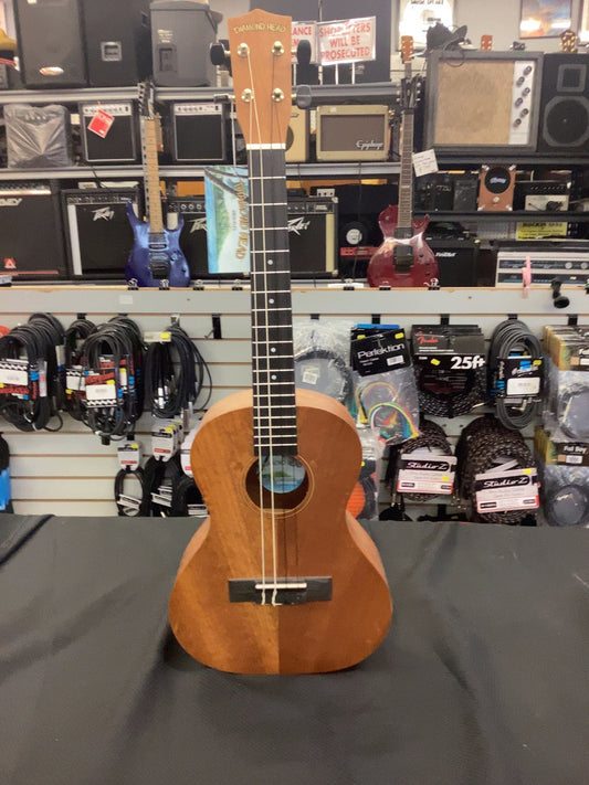 Ukuleles are popular for a reason-they are just plain fun to play. Slightly larger than a concert, the Diamond Head DU-200T Tenor Ukulele is carefully handcrafted with a mahogany body and neck and combined with a bridge and fingerboard made of rosewood wi