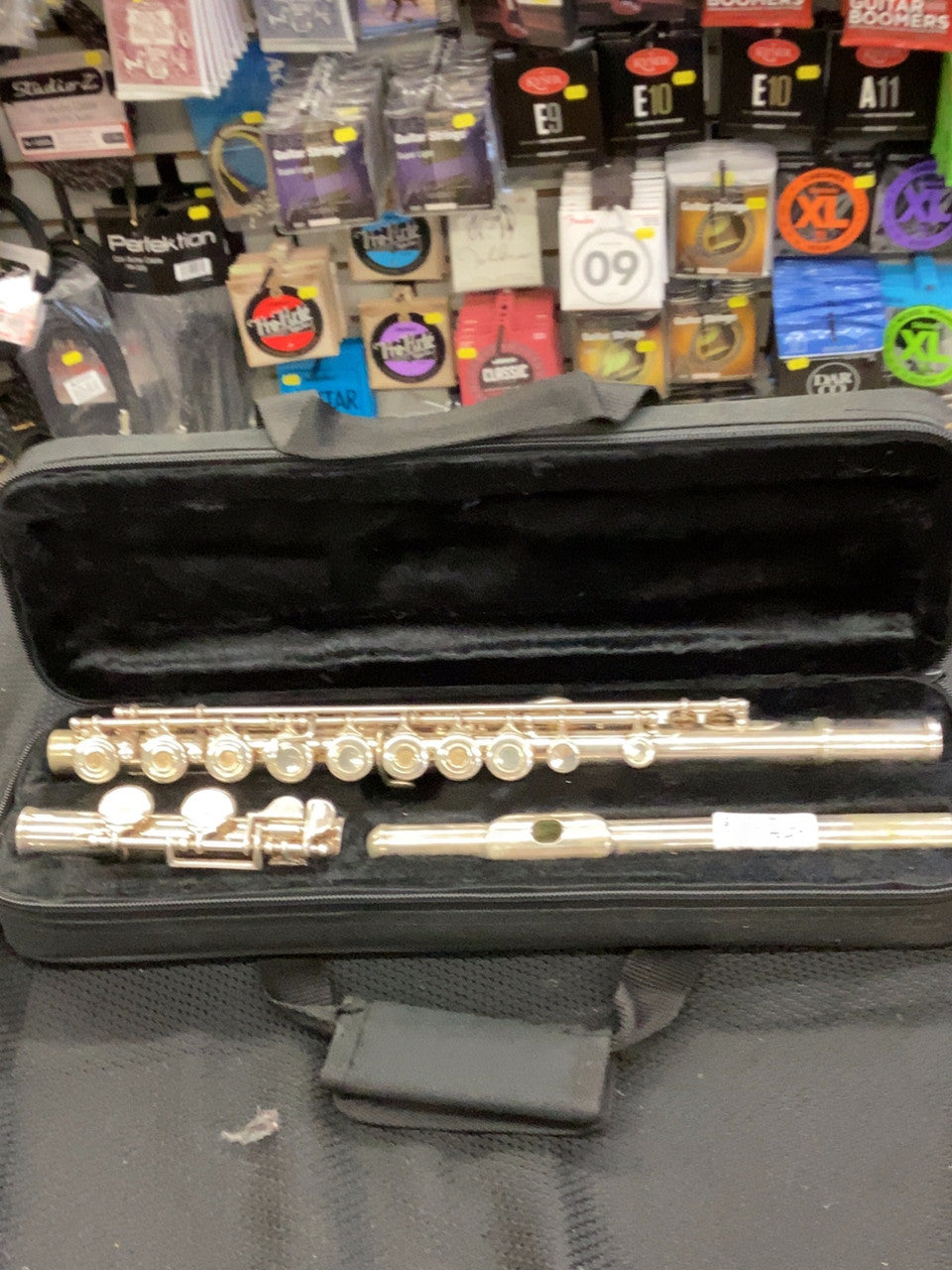 A flute in fair condition, perfectly capable of charming rodents and snakes alike with it's commanding treble.