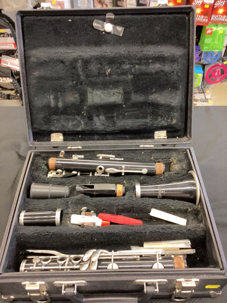 A Selmer clarinet in fair condition, offers smooth playing and a durable frame. Sold "as is"