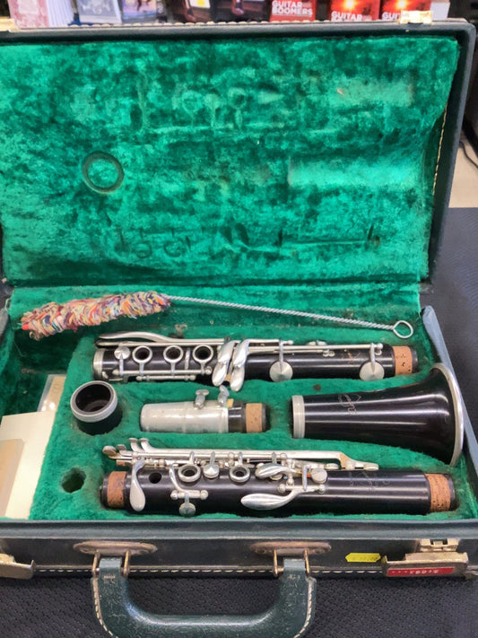 A Normandy clarinet, made in France and in fair condition, a tried and true woodwind instrument, perfect for beginners or anyone who is looking to get into clarinet.