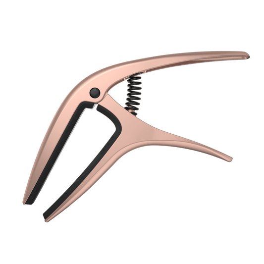 The Ernie Ball Axis Capo’s ergonomic features allow for fast and accurate single-handed key changes. Compatible with most electric and acoustic guitars, the Axis Capo offers eight color finishes to match, with a dual-radius design that fits both flat an