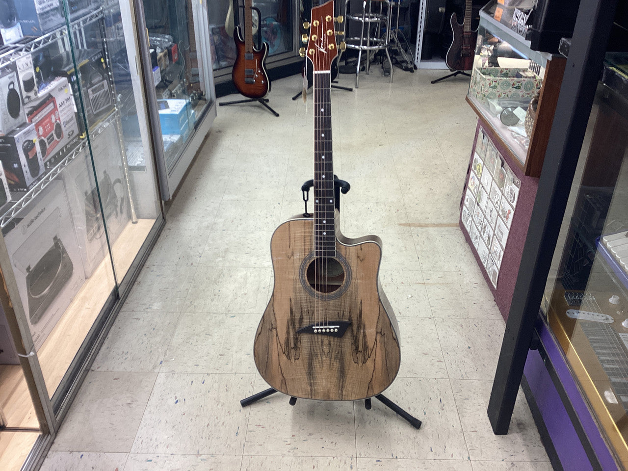 The K1E Series Spalted Maple Dreadnought with Cutaway Acoustic/Electric Guitar is the amp ready version of the #1 selling guitar in its class, the K1, with a few subtle upgrades added on. Simple and sturdy, this model has proven to be a work horse and a f